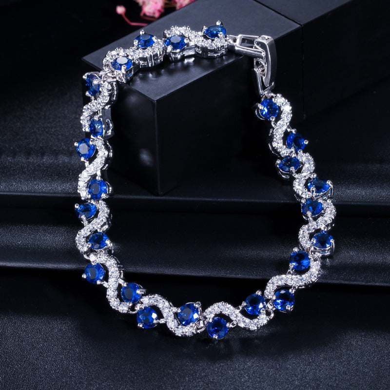 JLUXS Magnificent Ladies White Gold Rhodium Over Sterling Silver Created Sapphire & Created White Diamond Bracelet