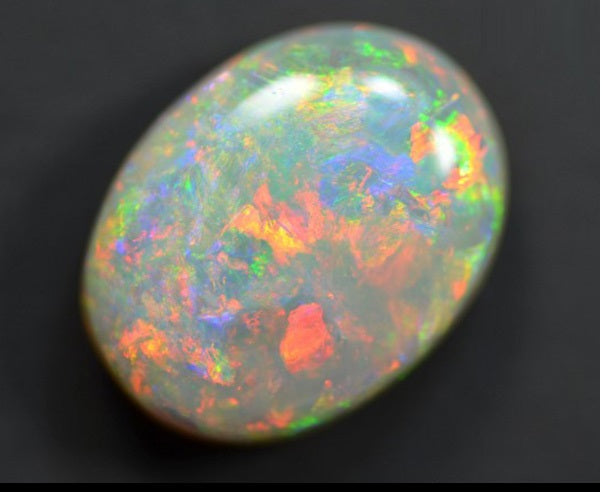 JLUXS OVAL CUT 8X10MM NATURAL ETHIOPIAN BLACK OPAL LOOSE GEMSTONE