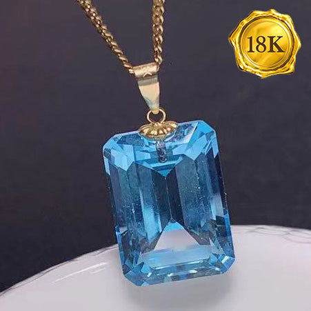JLUXS OCTAGON CUT 10.00 CT BLUE TOPAZ 18KT SOLID GOLD PENDANT