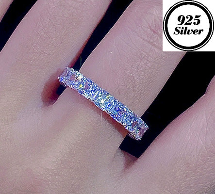 JLUXS Captivating Ladies White Gold Rhodium Over Sterling Silver Cubic Zirconia Eternity Ring