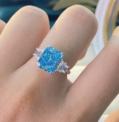 JLUXS Adorable Ladies White Gold Rhodium Over Sterling Silver Created Swiss Blue Topaz & Created Diamond Ring