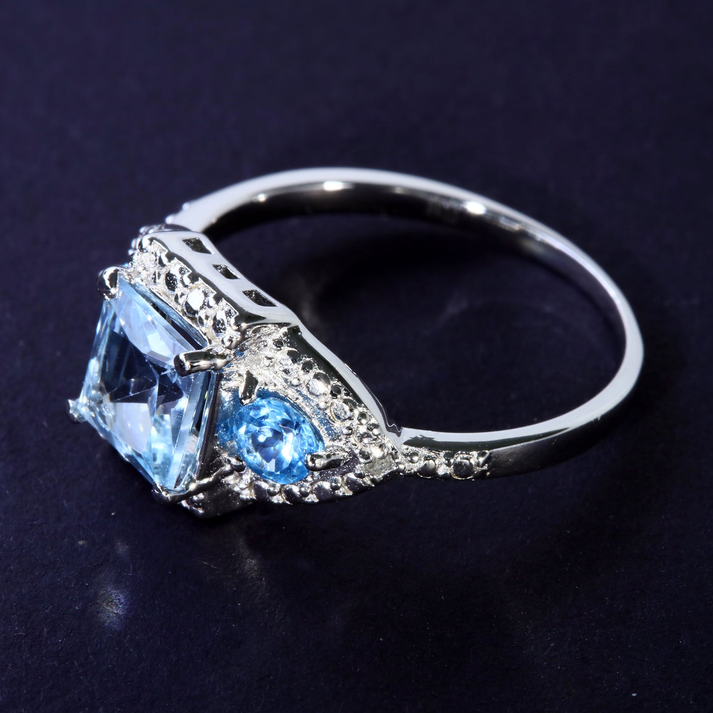 JLUXS Ladies White Gold Rhodium Over Sterling Silver Diamond & 1.40 Cts Blue Topaz Ring
