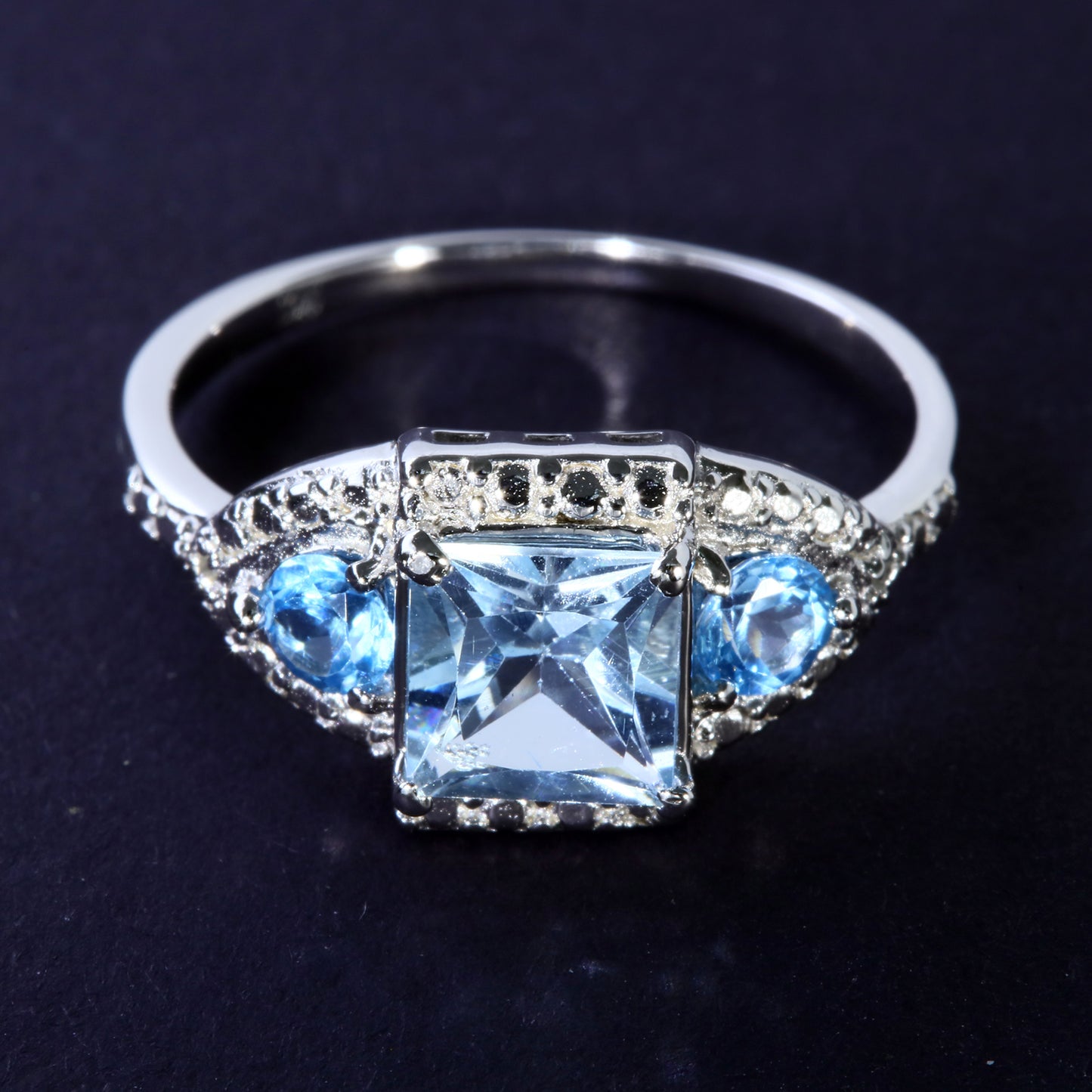 JLUXS Ladies White Gold Rhodium Over Sterling Silver Diamond & 1.40 Cts Blue Topaz Ring