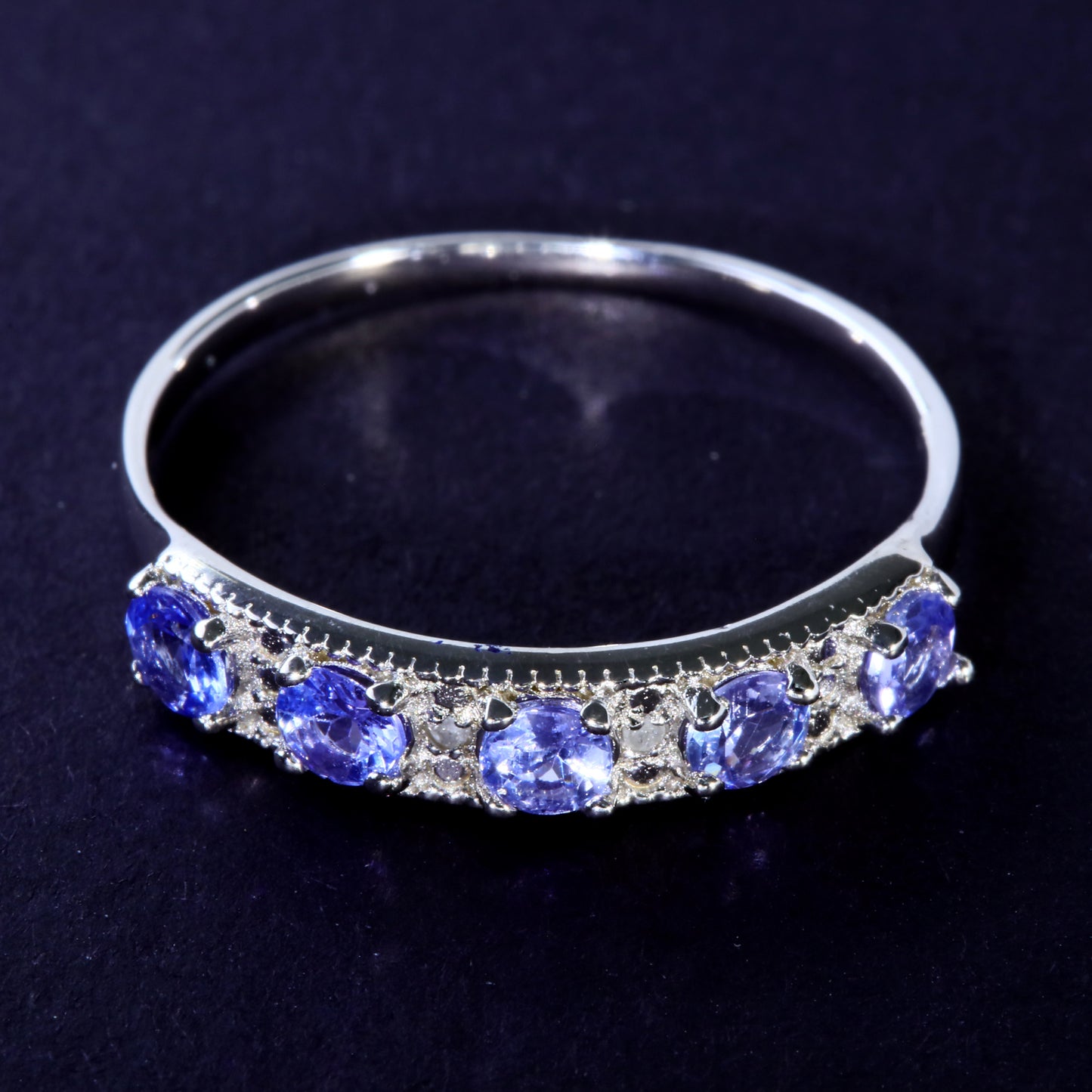 JLUXS Ladies White Gold Rhodium Over Sterling Silver Diamond & 1/2 Cts Tanzanite Band Ring